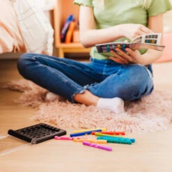 IQ Stixx Stacking Travel Game With 120 Challenges | Smart Games(Iq Stixx Smart Games 1) -Curious Bear Toys SmartGames SG 304 IQ Stixx lifestyle shot 28dabb