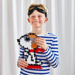 Peanuts© Puzzle By Number - Flying Ace 275 Pc Tube | Plus-Plus(Peanuts Puzzle By Number Flying Ace 275 Pc Tube Plus Plus) -Curious Bear Toys TUB05219 275pc Flying Ace Lifestyle3 LoRes 250501