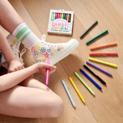Fabric Doodlers Markers - Set Of 12 | OOLY(Fabric Doodlers Markers Set Of 12 Ooly) 6 Fabric Doodlers Markers - Set Of 12 | OOLY(Fabric Doodlers Markers Set Of 12 Ooly) -Curious Bear Toys ooly fabric doodler markers 130 102 lifestyle image 2 2000x2000 1